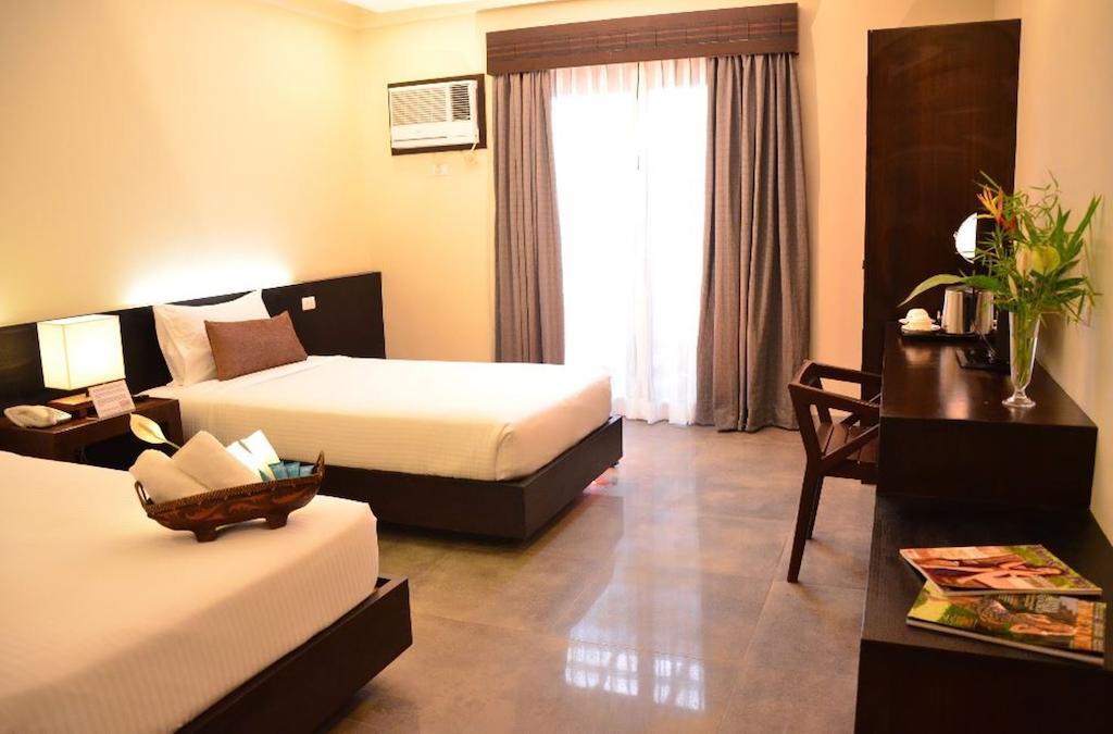 One Manalo Place Puerto Princesa Екстериор снимка